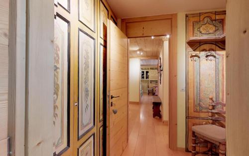 a hallway with a door leading to a room at St. Moritzerhof 42 in St. Moritz
