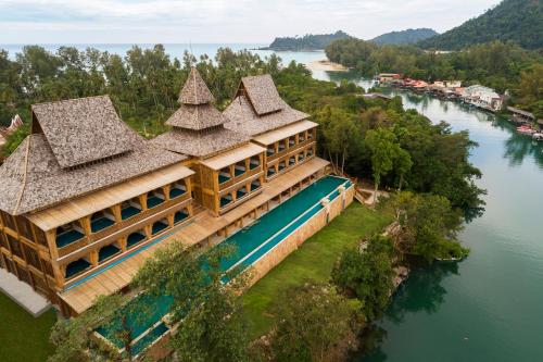 an aerial view of a resort on a river at Santhiya Tree Koh Chang Resort in Ko Chang