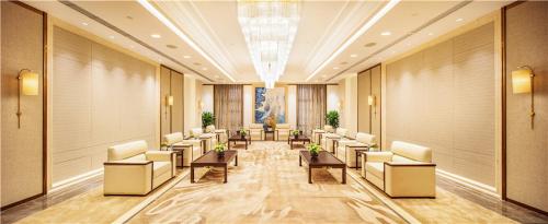 Χώρος καθιστικού στο Howard Johnson New District Plaza ZiYang