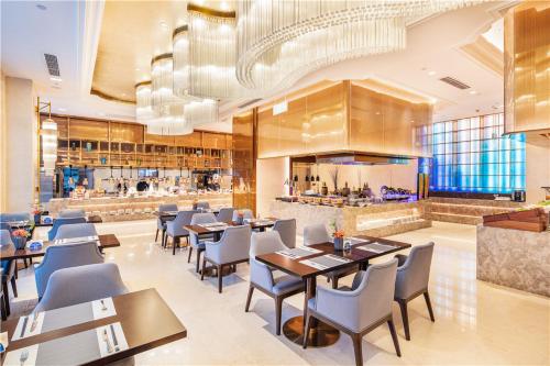 Εστιατόριο ή άλλο μέρος για φαγητό στο Howard Johnson New District Plaza ZiYang