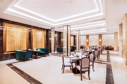 Χώρος καθιστικού στο Howard Johnson New District Plaza ZiYang