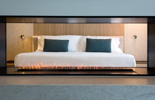 Hotel Terme Neronianeにあるベッド