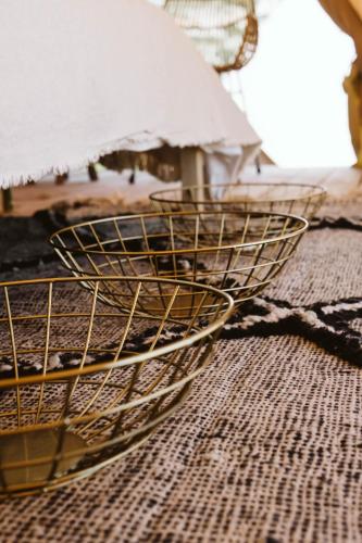 a yellow basket sitting on top of a table at Dreamsea Mediterranean Camp in Benitachell