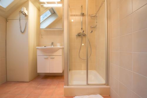 Et badeværelse på City Flats by Lybeer Hotel Group