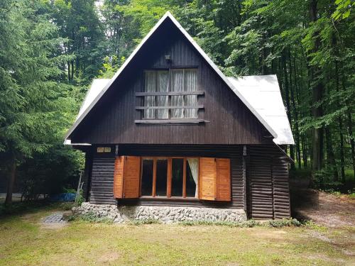 a small house in the middle of a forest at Slovak cottage near Bratislava in the heart of the Carpathians in Modra