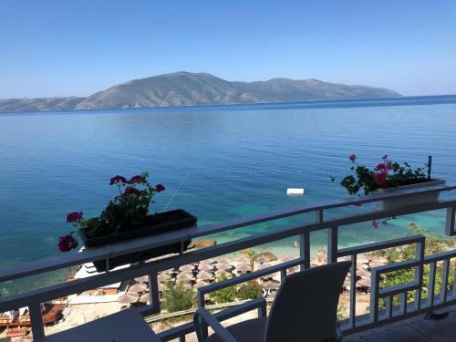 a view of the water from a balcony at Envi Hotel in Vlorë