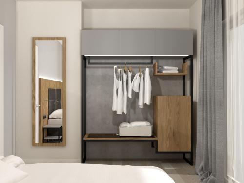 Letto o letti in una camera di Appartamenti Tre Colline