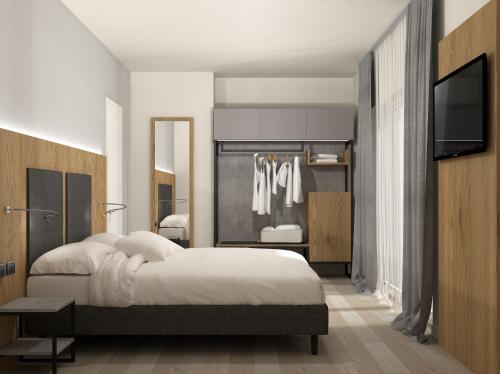Letto o letti in una camera di Appartamenti Tre Colline