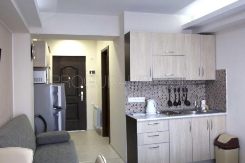 Η κουζίνα ή μικρή κουζίνα στο Gudauri Palace apartments in New Gudauri