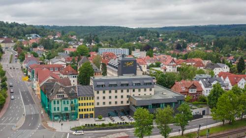 an aerial view of a city with buildings at HVD Grand Hotel Suhl Business & Leisure in Suhl