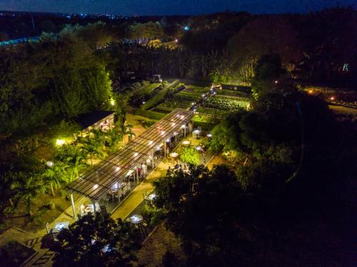 an overhead view of a park at night with lights at Shanti Maurice Resort & Spa in Bel Ombre