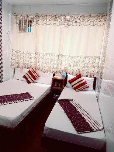 Postel nebo postele na pokoji v ubytování Simplex Guest House