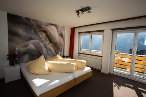 Postel nebo postele na pokoji v ubytování Hotel Eden