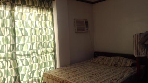 Ένα ή περισσότερα κρεβάτια σε δωμάτιο στο Jem Jeff Residence Inn