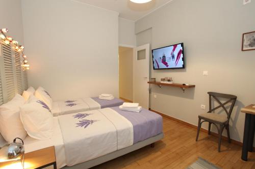 Your address in Koukaki by Athenian Homes