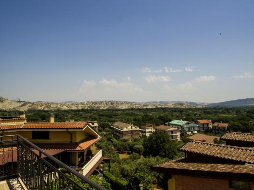 a view of a town with houses and mountains at Valdagri BnB in SantʼArcangelo
