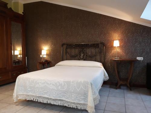 Un pat sau paturi într-o cameră la Agroturismo Sidreria Txindurri Iturri
