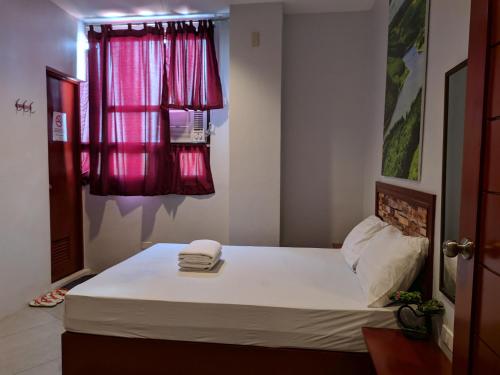 Postel nebo postele na pokoji v ubytování Hotel Turista