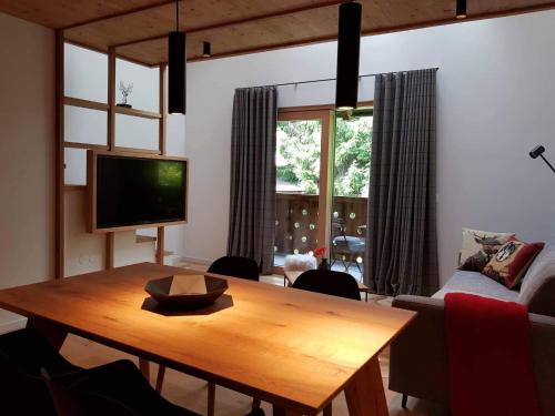 Télévision ou salle de divertissement dans l'établissement Apartmaji štAla
