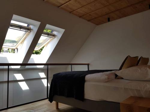 Un ou plusieurs lits dans un hébergement de l'établissement Apartmaji štAla
