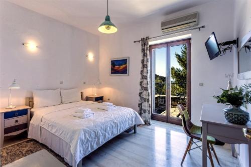 Postel nebo postele na pokoji v ubytování Vardia Hotel