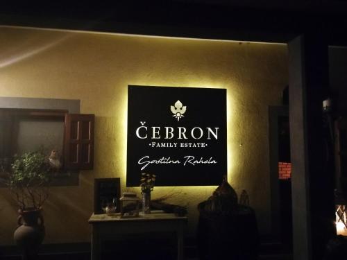 a sign on a wall that reads cetron family service at ČEBRON FAMILY ESTATE in Branik