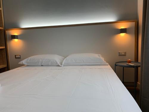 Ein Bett oder Betten in einem Zimmer der Unterkunft RED'S apartments
