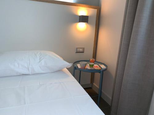 Ein Bett oder Betten in einem Zimmer der Unterkunft RED'S apartments