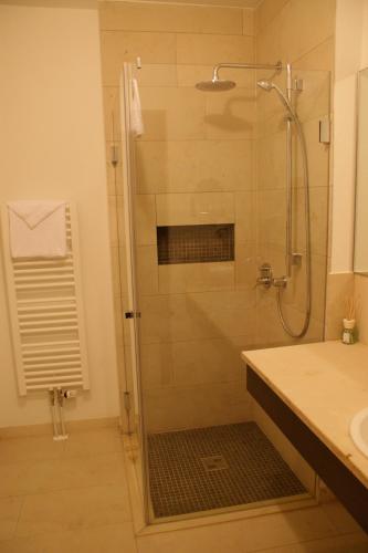 Koupelna v ubytování KH Hotel mit Restaurant