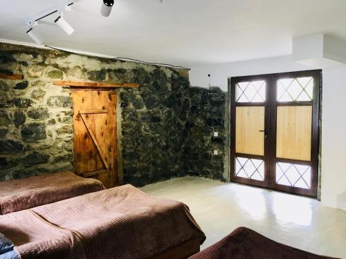 Posezení v ubytování Manoni Ratiani's Guesthouse