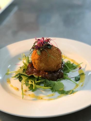 a plate of food on a white plate at Deeping Stage in Market Deeping