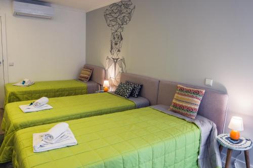 In Barcelos Hostel & Guest Houseにあるベッド