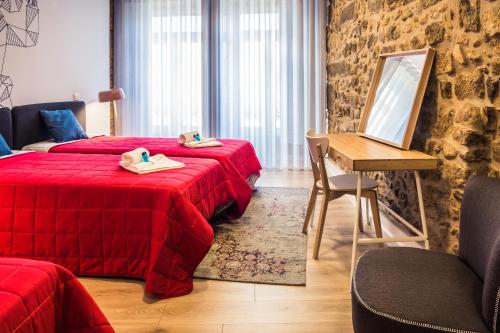 In Barcelos Hostel & Guest Houseにあるベッド