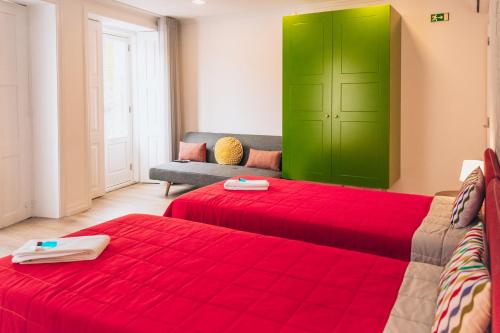 In Barcelos Hostel & Guest Houseにあるベッド