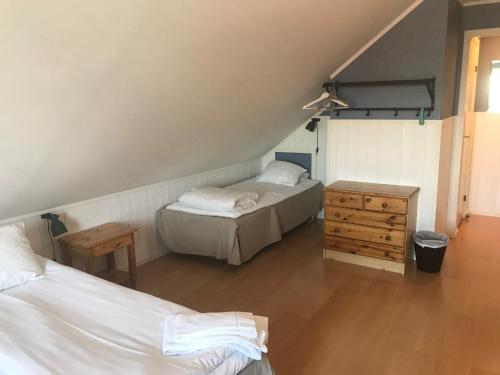 Tempat tidur dalam kamar di Klovabo Bed & Breakfast