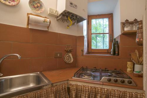 Η κουζίνα ή μικρή κουζίνα στο Castello Di Proceno Albergo Diffuso In Dimora D'Epoca