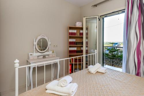 Ένα ή περισσότερα κρεβάτια σε δωμάτιο στο Adelinas' Apartment