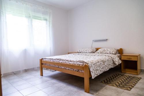 Voodi või voodid majutusasutuse Bogoljubova vinska koliba toas
