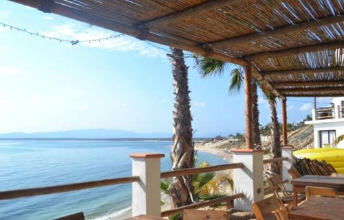 a view of the beach from a resort balcony at Villa Paraíso in La Ventana