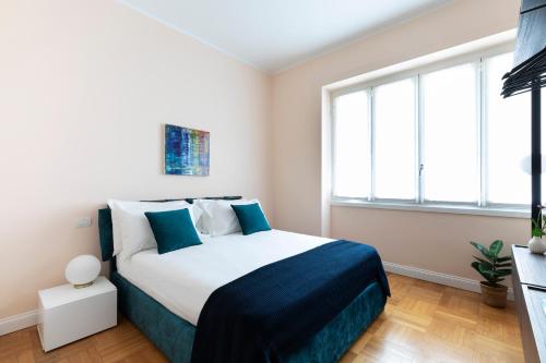 Milano Manzoni CLC Apartmentsにあるベッド