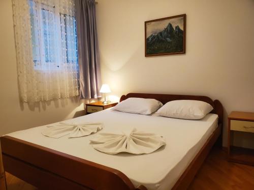 Postel nebo postele na pokoji v ubytování Egon Apartments