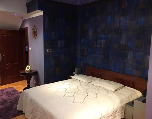 Кровать или кровати в номере Luxury House