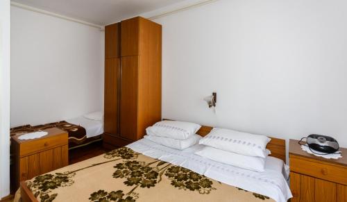Llit o llits en una habitació de Apartmani Jelica