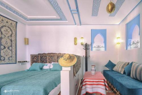 Cama o camas de una habitación en Dar Rafik