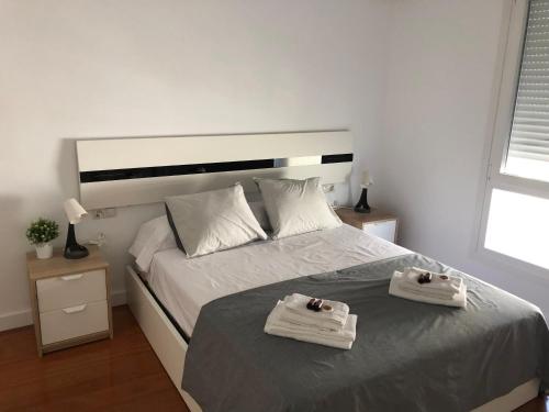 Postel nebo postele na pokoji v ubytování Apartamento Malagueta 1 Linea playa centro Malaga