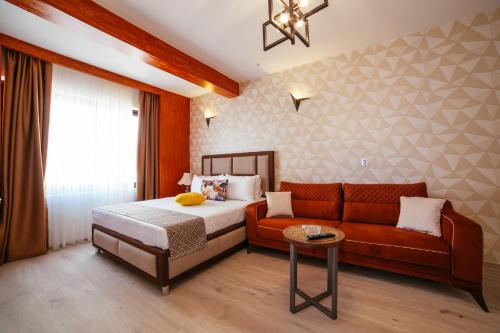 מיטה או מיטות בחדר ב-Hotel Platinum