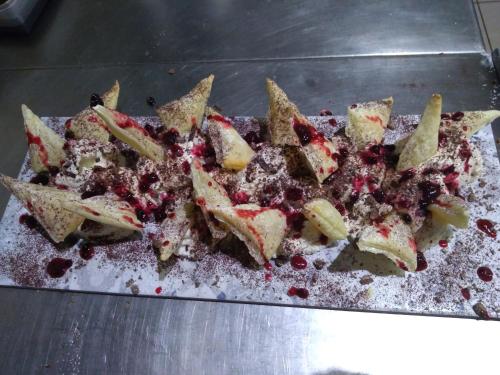 a pile of food sitting on a table at Fattoria Bertaccini in Cesena