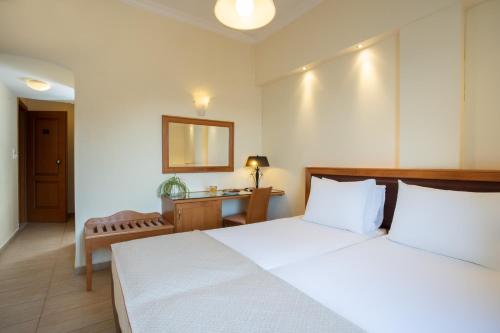 Cama o camas de una habitación en Pantheon City Hotel