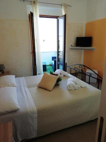 Postel nebo postele na pokoji v ubytování b&b MareSalento