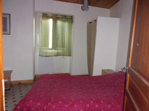 Ένα ή περισσότερα κρεβάτια σε δωμάτιο στο triplex douillet